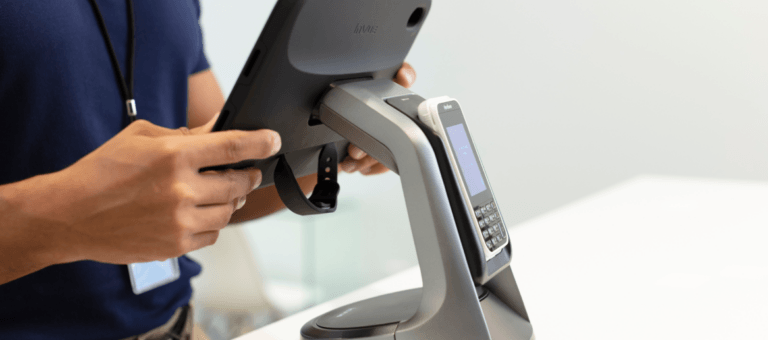 Hand using tablet stand