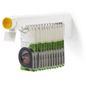 T1000 dispenser holding Almay beauty products