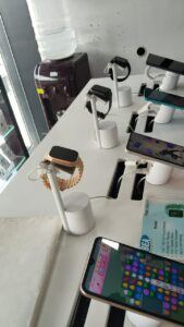 Smartwatches and tablets displayed on InVue secure displays