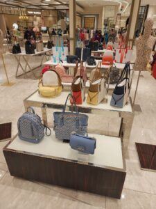 Handbags on secure display at Maxcess