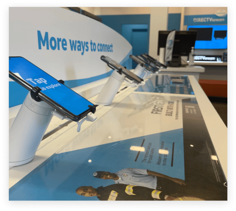 Phone on display with a OnePOD in an AT&T store