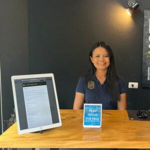 Woman at table with InVue products at SiamSportsPro