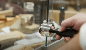 OneKEY unlocking a glass cabinet