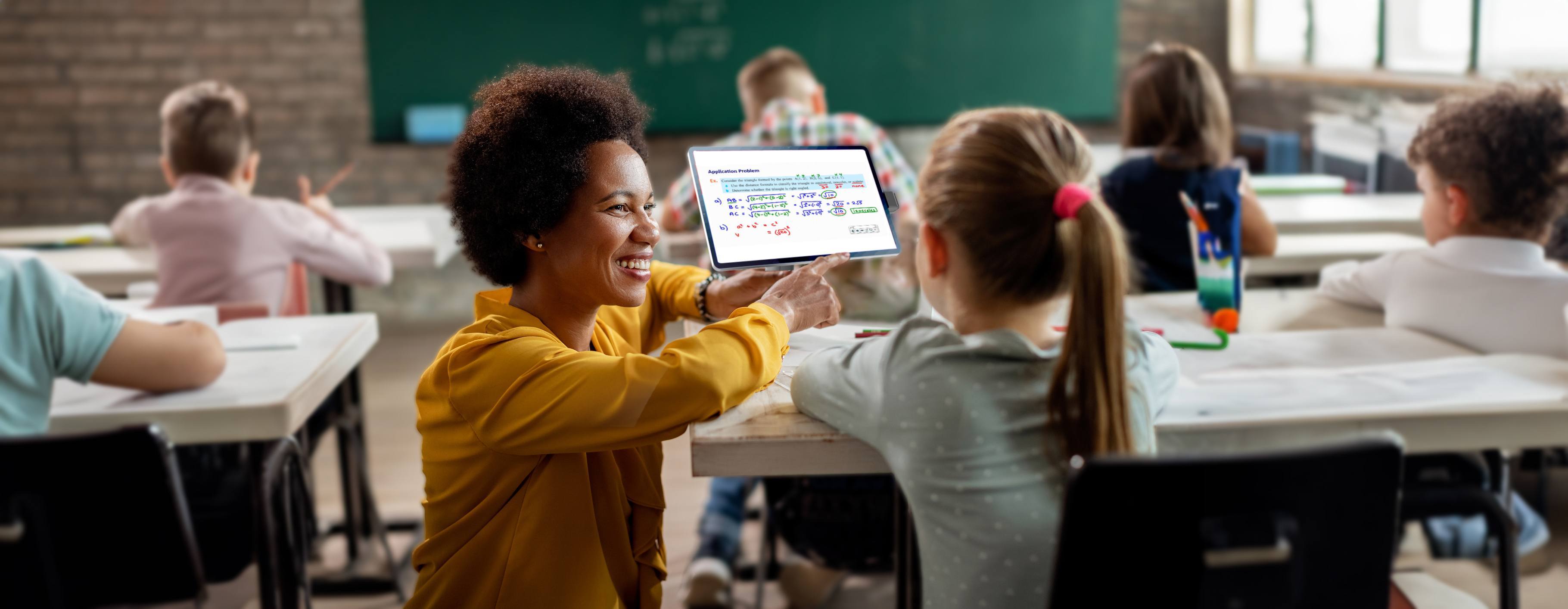 Teacher with student next to a NE150 tablet stand