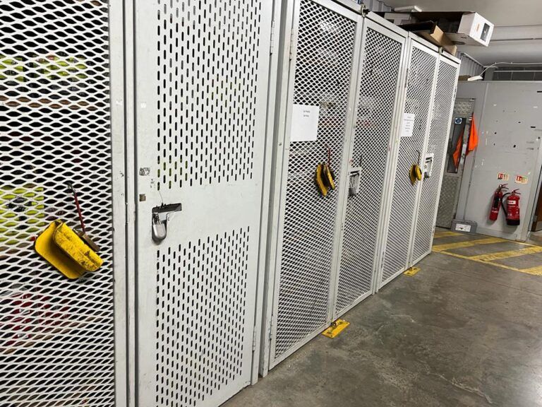 Padlock securing product storage lockers at Halfords