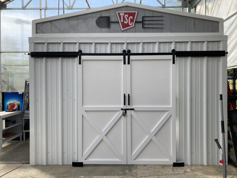Padlock securing large storage room at Tractor Supply