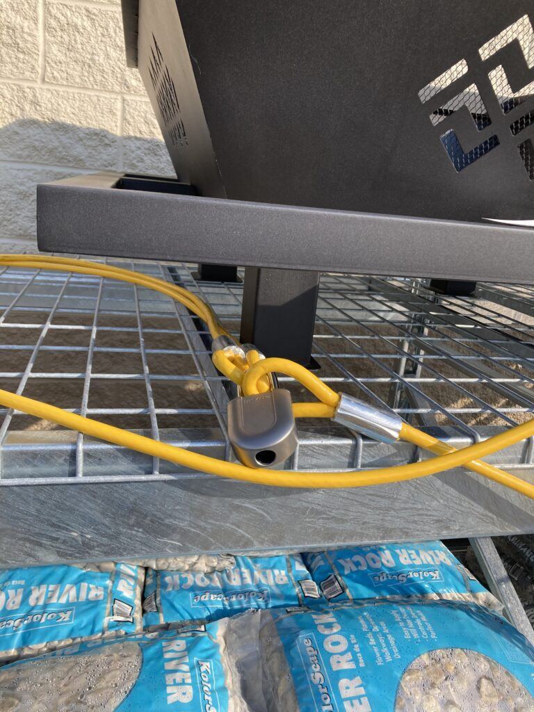 Padlock securing product at Tractor Supply