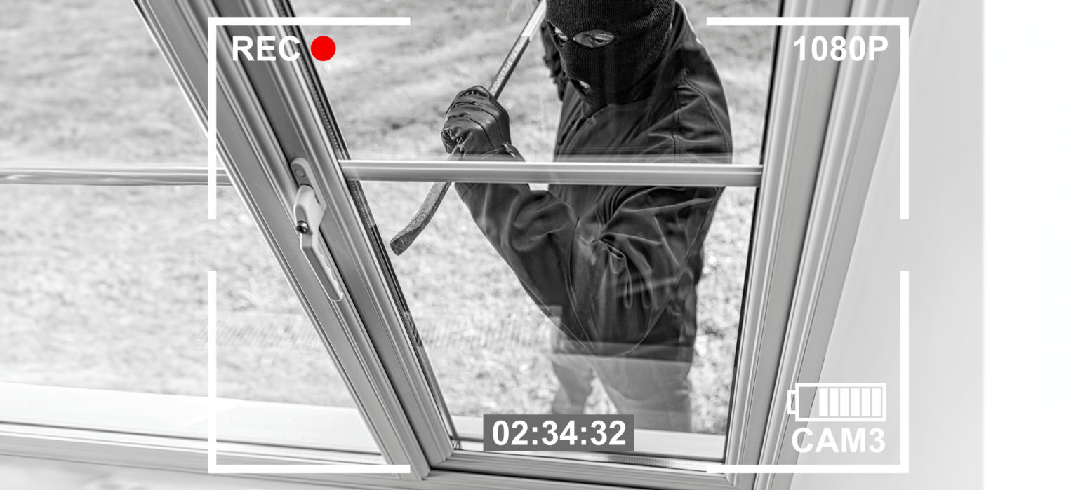 Man Breaking into Store