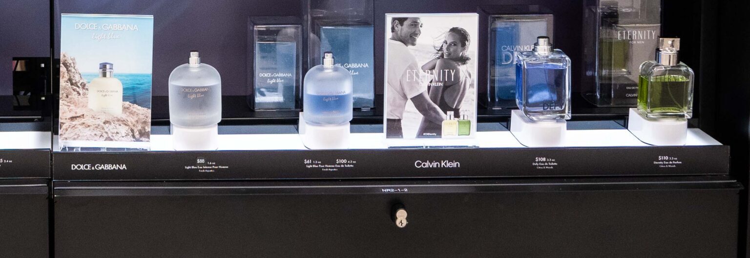A fragrance tester display with security solutions that secure each tester while enhancing the beauty brand and allowing customers to interact with the perfumes