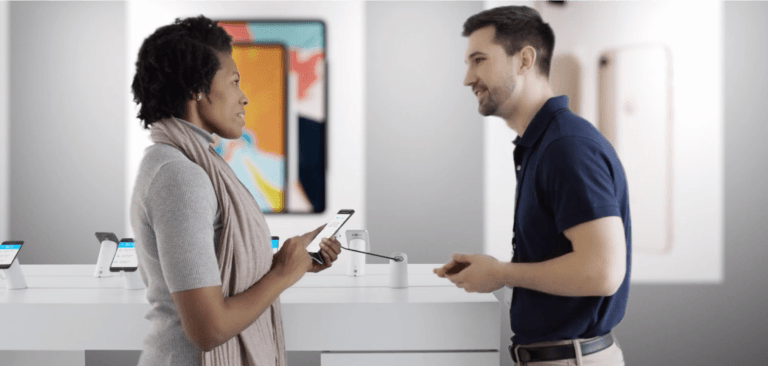 Woman and man looking at phones with secure solutions