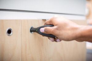 Woman Hand Unlocking OneKEY Lock