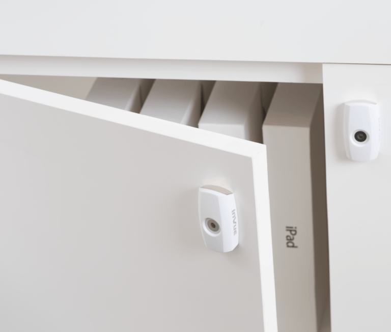 InVue Smart Cam Lock in white, designed for advanced security solutions