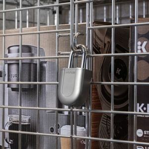 InVue padlock securing a cage holding Keurig products