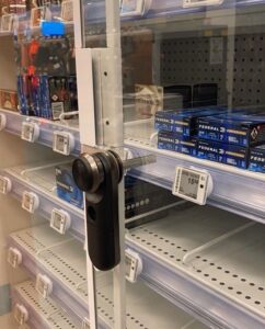 LIVE Plunger Locks securing a glass case at Canadian Tire.