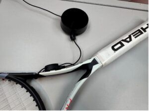 Zips Alarming Adjustable Loop Recoiler on Tennis Racket