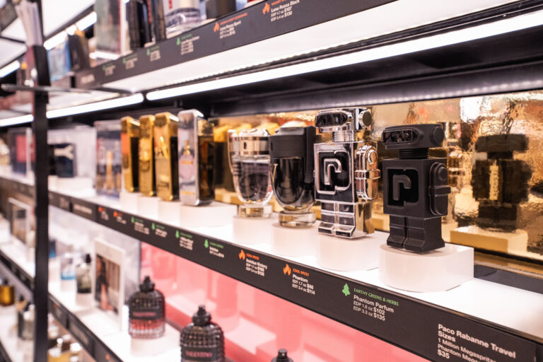 Shelve with beauty testers being secured by security displays