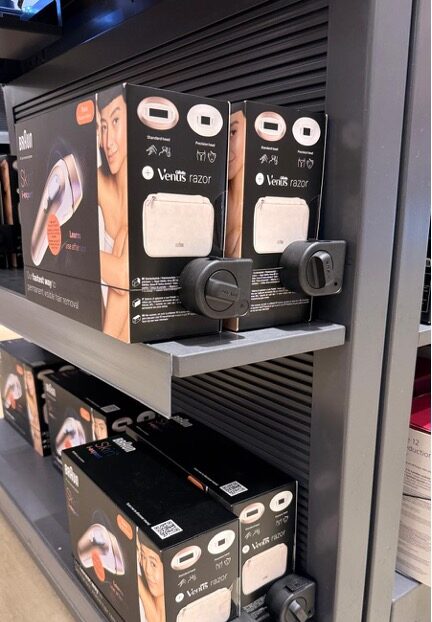 InVue's package protection: Corner Package Wrap securing retail health and beauty products.