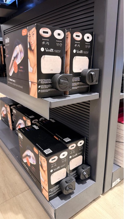 InVue's package protection: Corner Package Wrap securing retail health and beauty products.